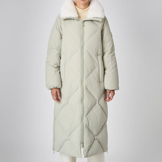 DIDA Women's Long Winter Coat – sustainable outerwear made from 100% recycled materials with repurposed down insulation.