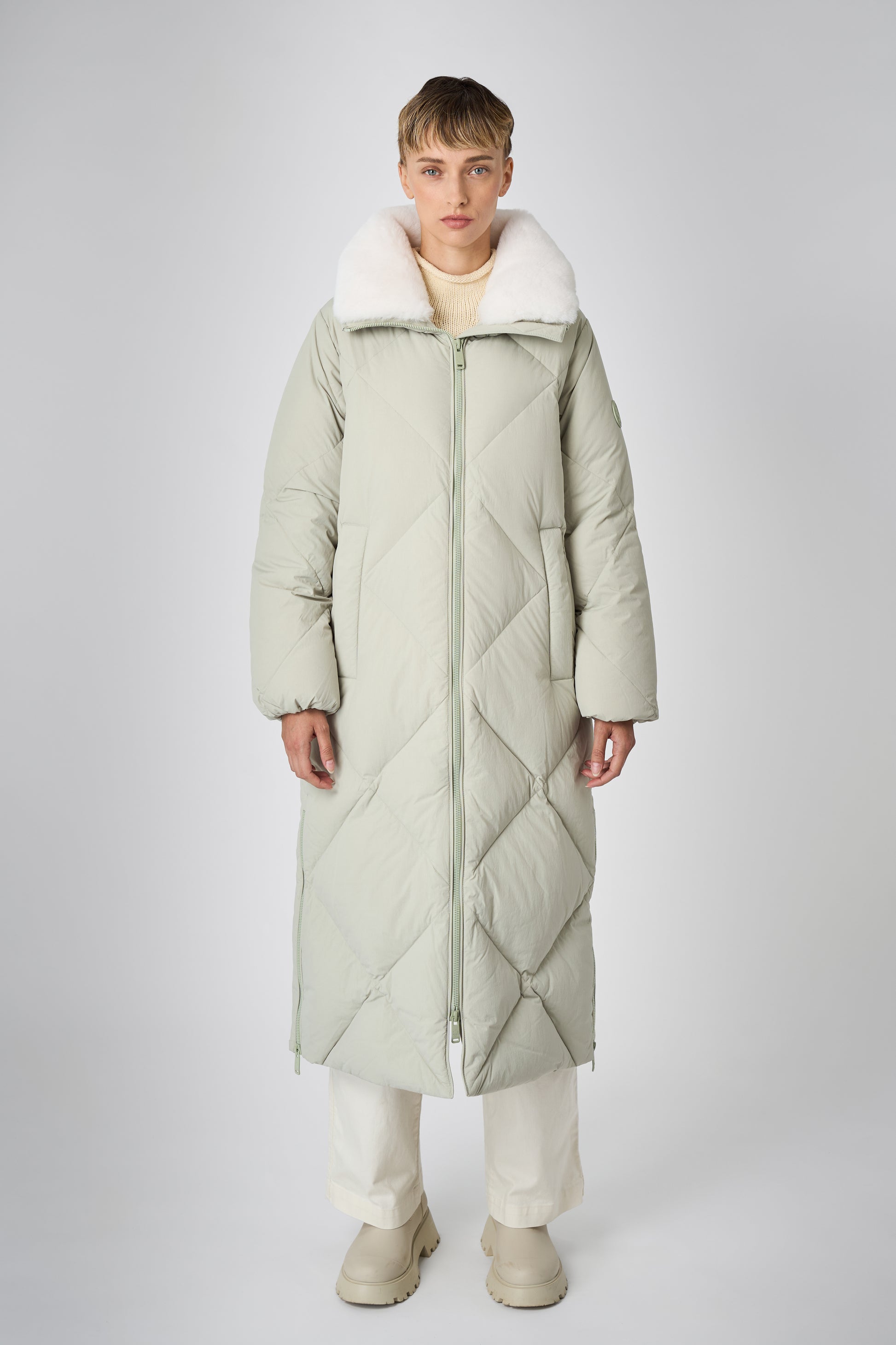 DIDA Women's Long Winter Coat – sustainable outerwear made from 100% recycled materials with repurposed down insulation.