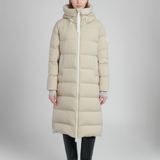 Nora Women's Long Winter Coat – sustainable outerwear made from 100% recycled materials with repurposed down insulation.