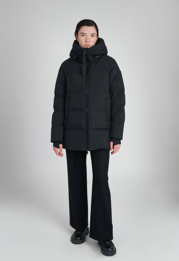 Orva Women's Down Puffer Coat – sustainable winter outerwear made from 100% recycled materials with repurposed down insulation.